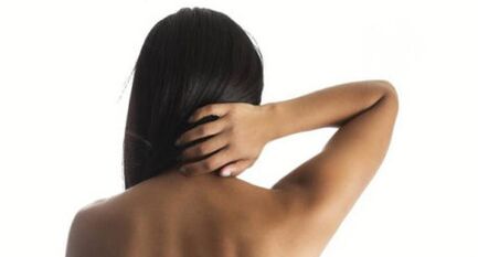 The girl shows her neck from the back of your back